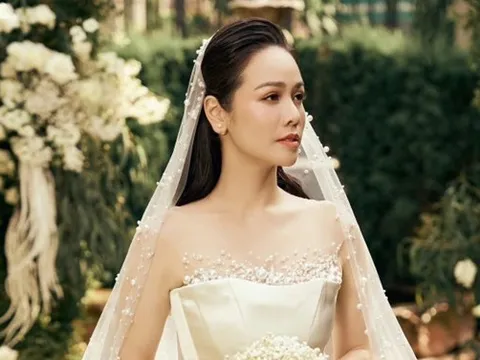 Ca sĩ Nhật Kim Anh bất ngờ diện váy cưới, danh tính chú rể gây tò mò?